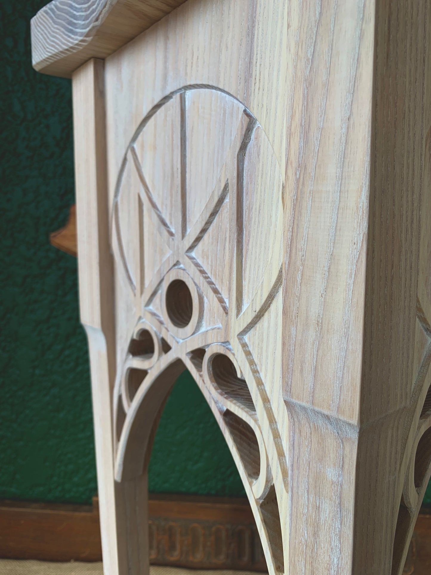 Close up of carved detail in ash wood Lord of the Rings inspired table.
